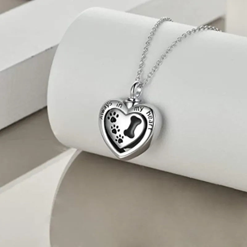 Collier urne commémorative pour animaux de compagnie avec empreinte de patte