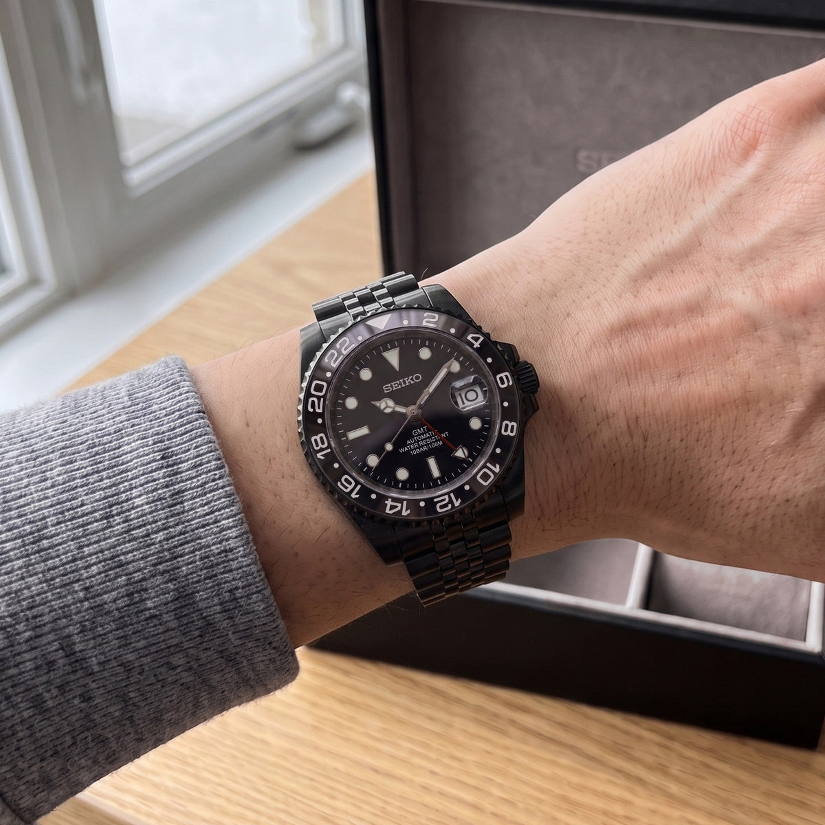 Stealth Redstrike Seiko mod GMT on the wrist, Jubilee | strap=Jubilee